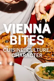 Slogan “Vienna Bites. Cuisine, Culture, Character” in the background Food on a table