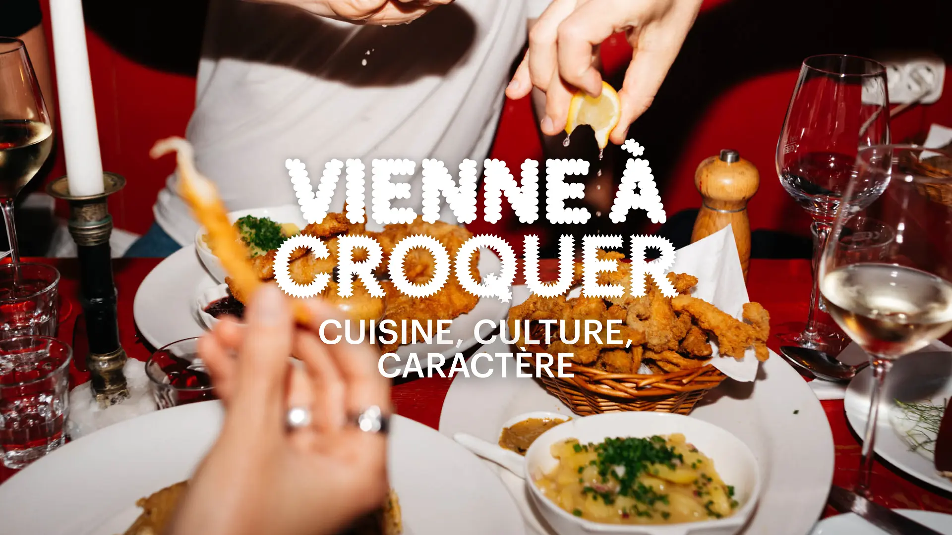 Slogan « Vienna à Croquer. Cuisine, culture, caractère » en arrière-plan Nourriture sur une table