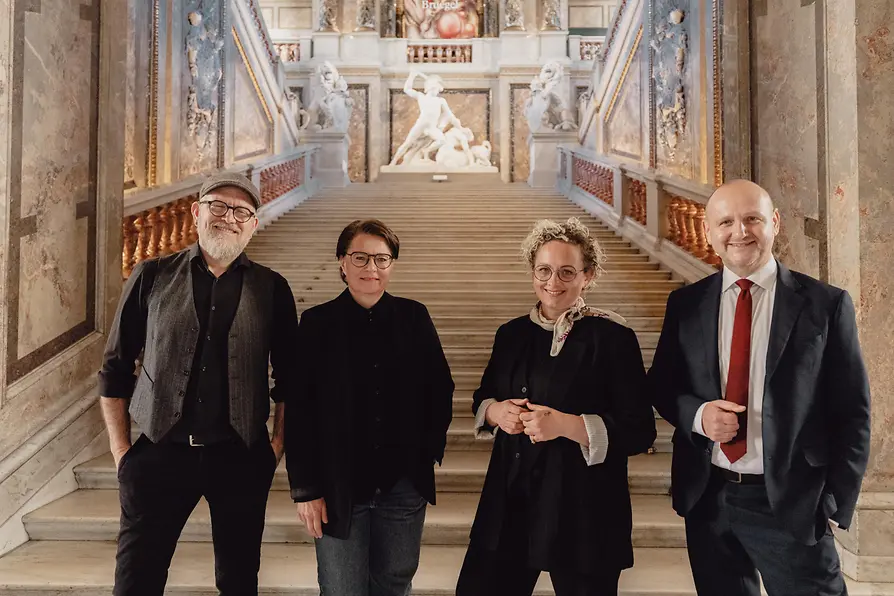 Group of sign language interpreters with Tourism Director Norbert Kettner 