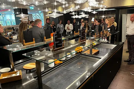 Participants take part in an accessibility awareness training session at the Vienna Marriott Hotel. The image shows practical learning to improve inclusive service and barrier-free access.