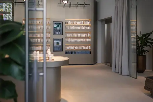 Interior of the BIOGENA store on Mariahilfer Straße with shelves stocked with dietary supplements.