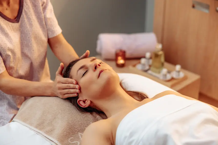 Guest receiving a head massage at Sans Souci Spa.