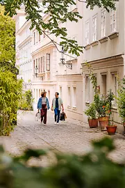 A woman and a man shopping in Spittelberg