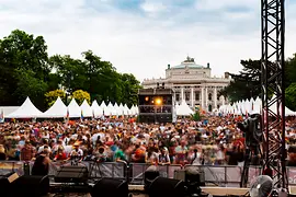 Rainbow Parade on City Hall Square with a view of the Burgtheater 