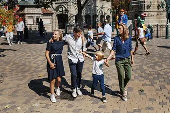 Two children with their parents in the Vienna Prater