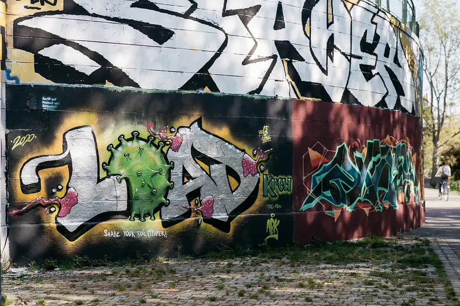 WienTourismus / Gregor Hofbauer Coronavirus street art along Vienna's Danube Canal