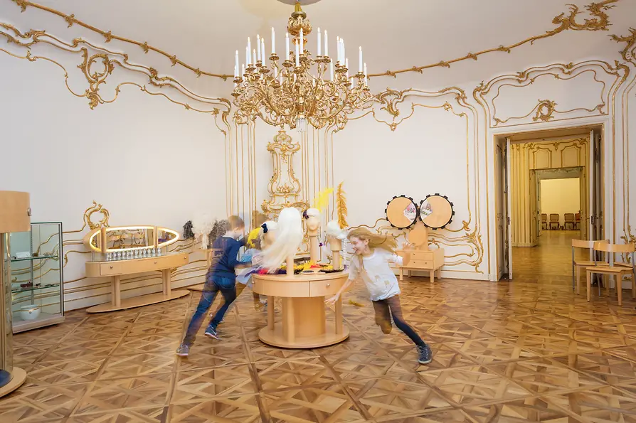Schönbrunn Palace Children's Museum, children play in a magnificent room