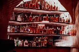 Bar Pigalle, shelf with spirits