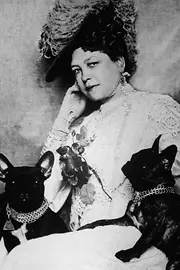 Anna Sacher, portrait photo with her two favorite dogs